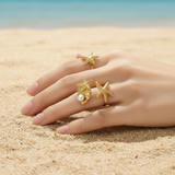 Anillo estrellas de mar perla oro