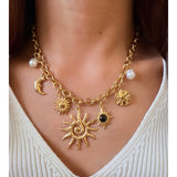 Collar charms astro sol oro