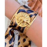 Pulsera sol con pañuelo oro
