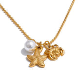Collar mini estrella cangrejo perla oro
