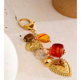 Charm Bolso Corazón oro