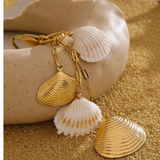 Charm bolso conchas naturales oro