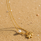 Collar mini estrella cangrejo perla oro