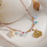 Collar cordon chamrs marinos oro