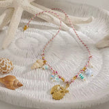 Collar cordon chamrs marinos oro