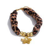 Collar pañuelo animal print flor oro