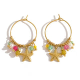 Pendiente estrellas colores oro