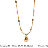 Collar cuentas y colgante ojo de tigre oro