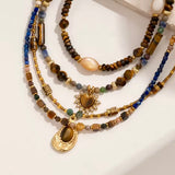 Collar corazón ojo de tigre oro