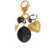 Charm bolso negro oro