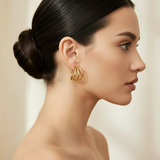 Pendiente triple oro