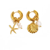 Pendiente estrella de mar y concha perla oro