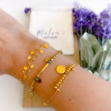 Pulsera doble moneda oro