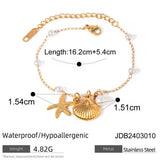 Pulsera estrella de mar y concha perla oro