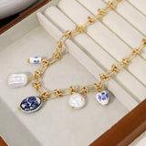Collar Charms Cerámica Nudos oro
