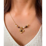 Collar Flor ojo de tigre oro