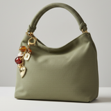 Charm Bolso Corazón oro
