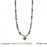 Collar corazón ojo de tigre oro