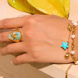 Anillo Estrella de Mar Transparente Agua Marina oro