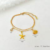 Pulsera Charms Estrella de Mar y Concha oro