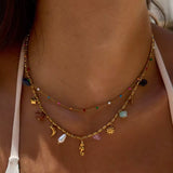 Collar doble Charms caballito de mar oro