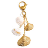 Charm Conchas oro