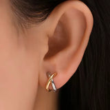 Pendiente mini cruzado bicolor