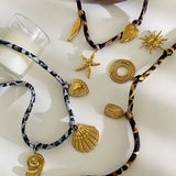 Collar Cordón Print Charms Estrella oro