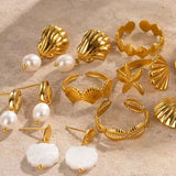 Anillo mini conchas oro