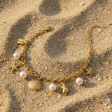 Pulsera charms marinos oro
