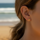 Pendientes estrella concha oro